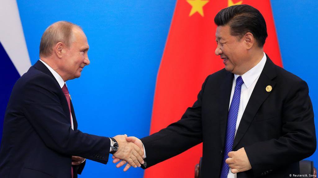 Putin, Xi Make Thinly Veiled Criticisms of US Over Afghanistan and COVID-19 Origin Tracing